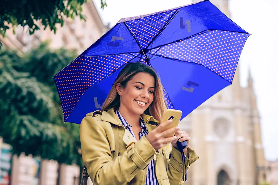 Nostos - Woman holding umbrella